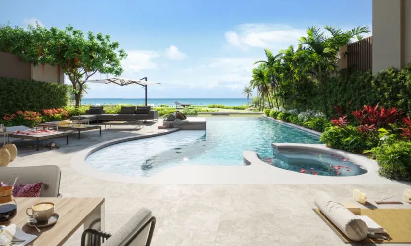 Banyan Tree Beach Residences Sirena 一個住宅露台的電腦效果圖:私人泳池與按摩泳池,設躺椅,越過樹冠望向大海