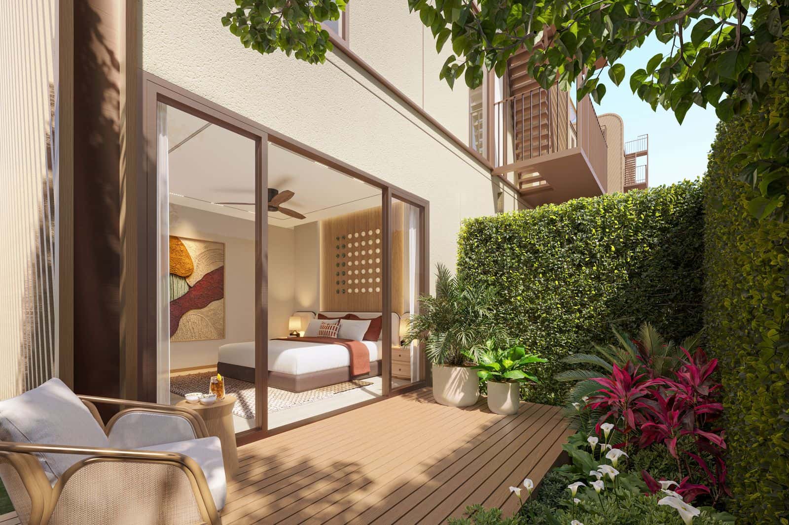 ภาพจำลองห้องนอนชั้นล่างของทาวน์โฮมที่ Banyan Tree Beach Residences Varuna เปิดออกสู่ลานสวน