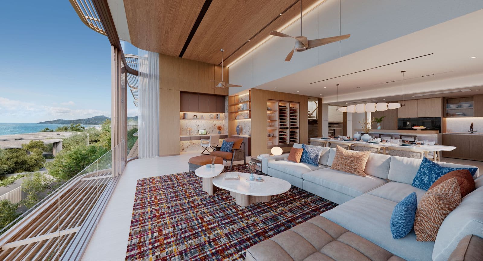ภาพจำลองห้องนั่งเล่นบนชั้นสามของทาวน์โฮมที่ Banyan Tree Beach Residences Varuna ผนังกระจกสูงจรดเพดานหันสู่ทะเล