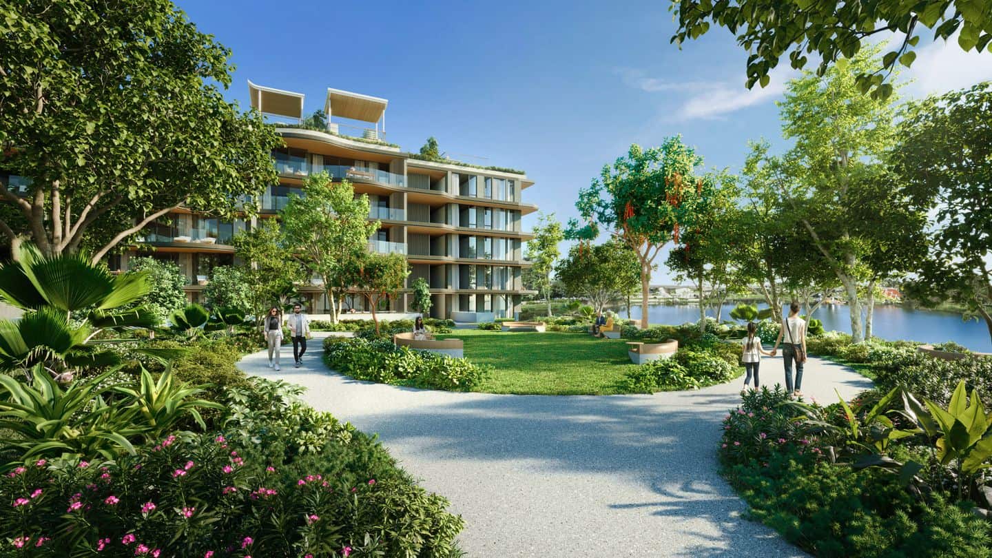 ภาพจำลองสวนของ Bellaguna Lake Residences Lotus ริมลากูน มีทางเดิน สนามหญ้า และอาคารอยู่ถัดไป