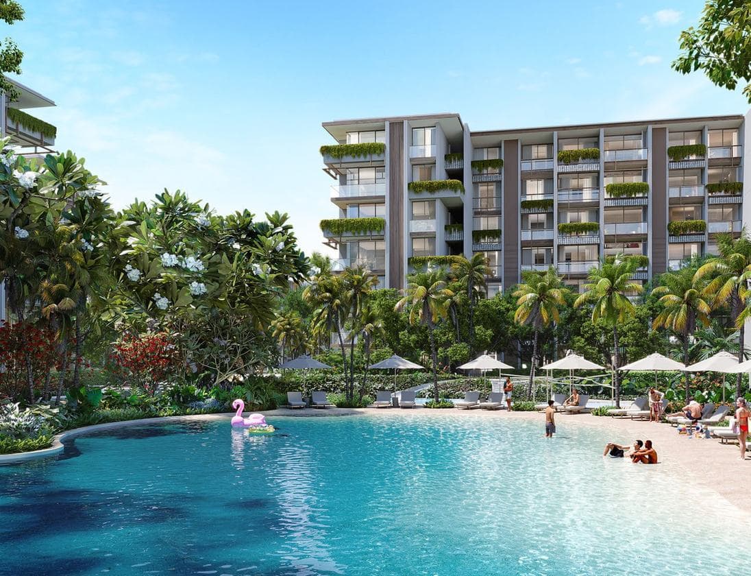 Computer-generated render of a building of Lake Residences, Gardens of Eden, Phuket, above a lagoon pool with a sandy beach edge