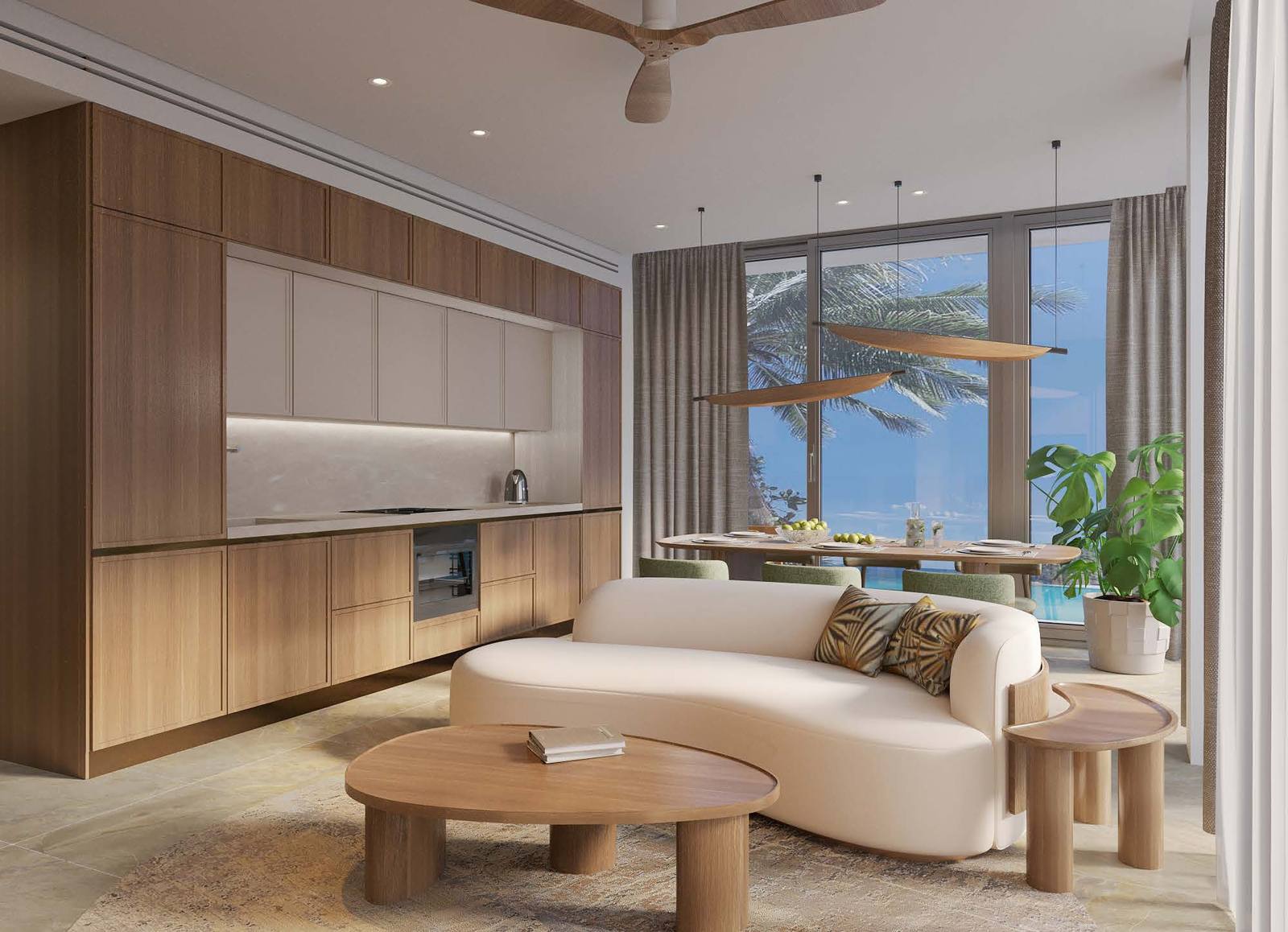 ภาพจำลองจากคอมพิวเตอร์ของห้องนั่งเล่นและครัวในห้องชุดที่ Park Residences ใน Gardens of Eden ภูเก็ต โทนไม้วอลนัท มีโซฟาทรงโค้ง