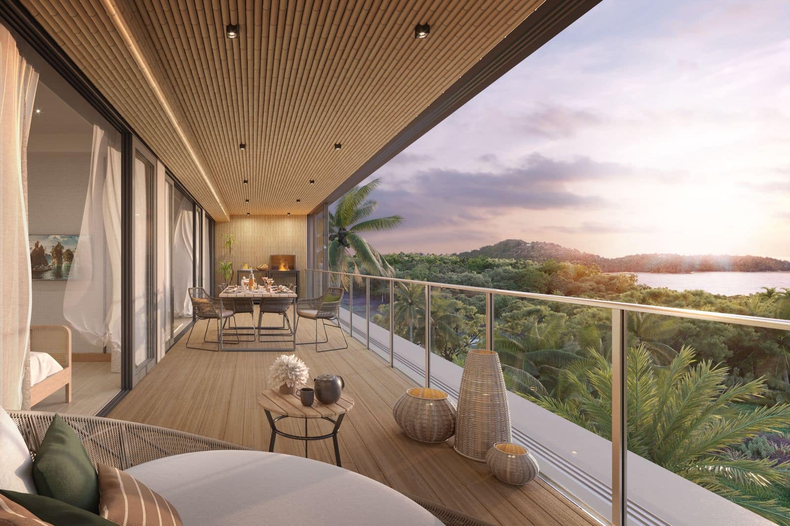 Визуализация ланай квартиры с тремя спальнями в Laguna Beach Residences Seashore на закате: обеденный стол и зона отдыха за стеклянным ограждением, дальше море и мыс