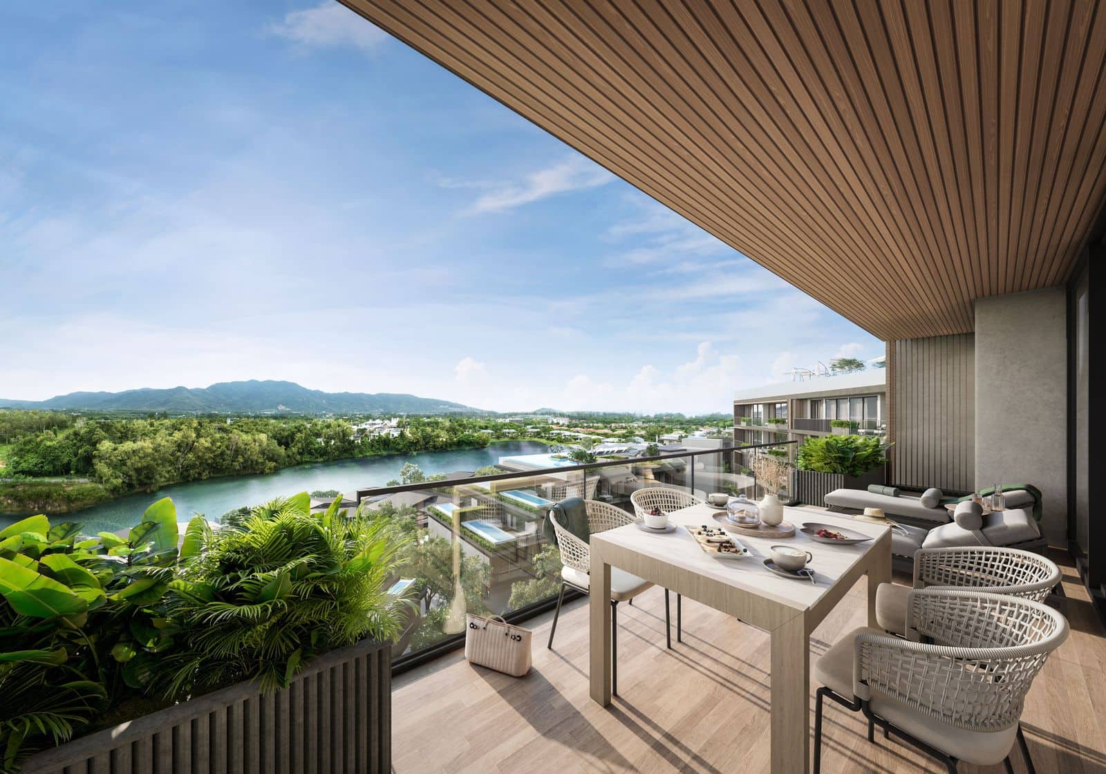 ภาพจำลองโต๊ะรับประทานอาหารบนระเบียงที่ Laguna Lakelands Waterside Residences เหนือคลองของทะเลสาบ เนินเขาอยู่ไกลออกไป