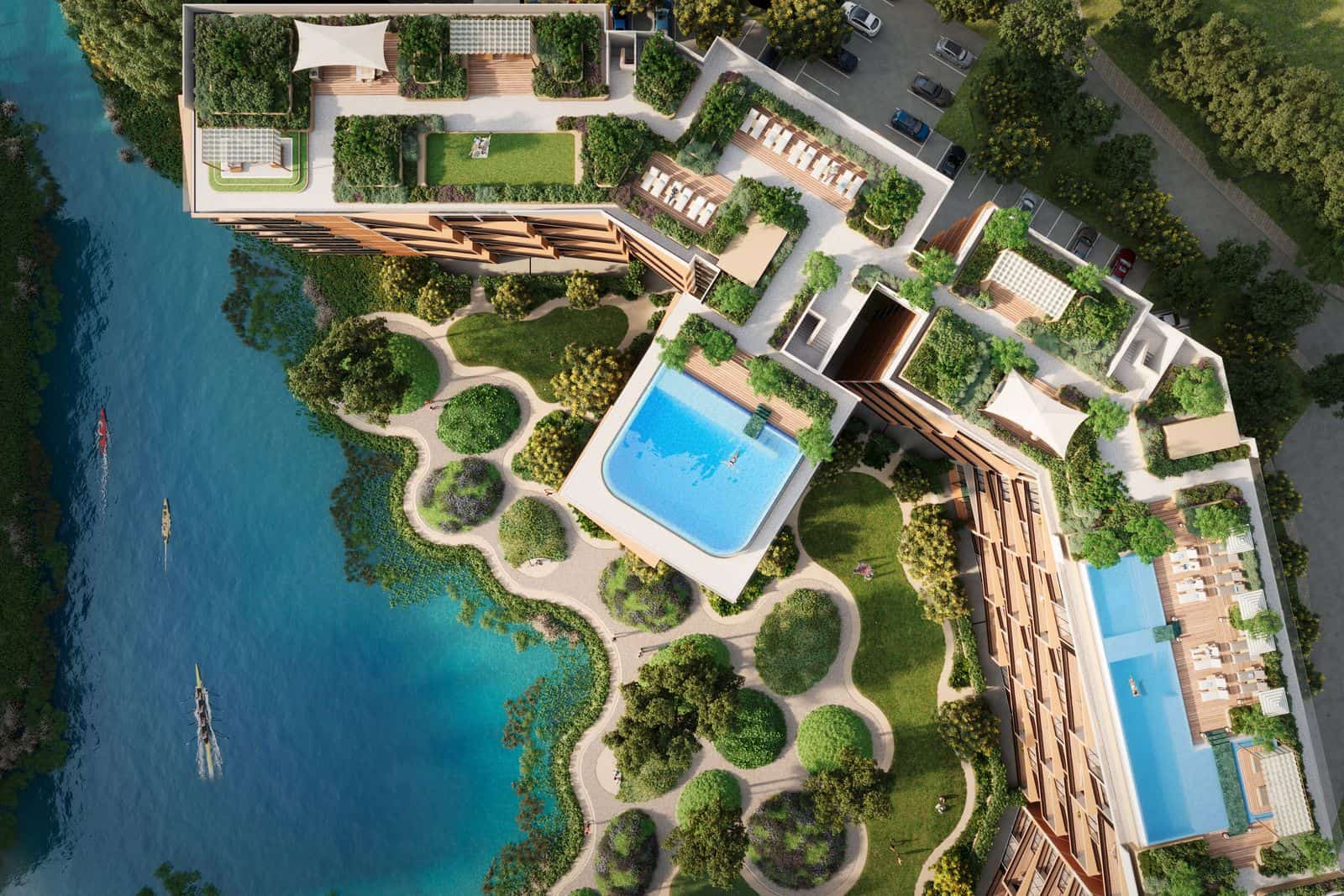 Render from directly above Skypark Elara Lakelands Phuket: the blocks' rooftop pools and terraces, the gardens and the lake