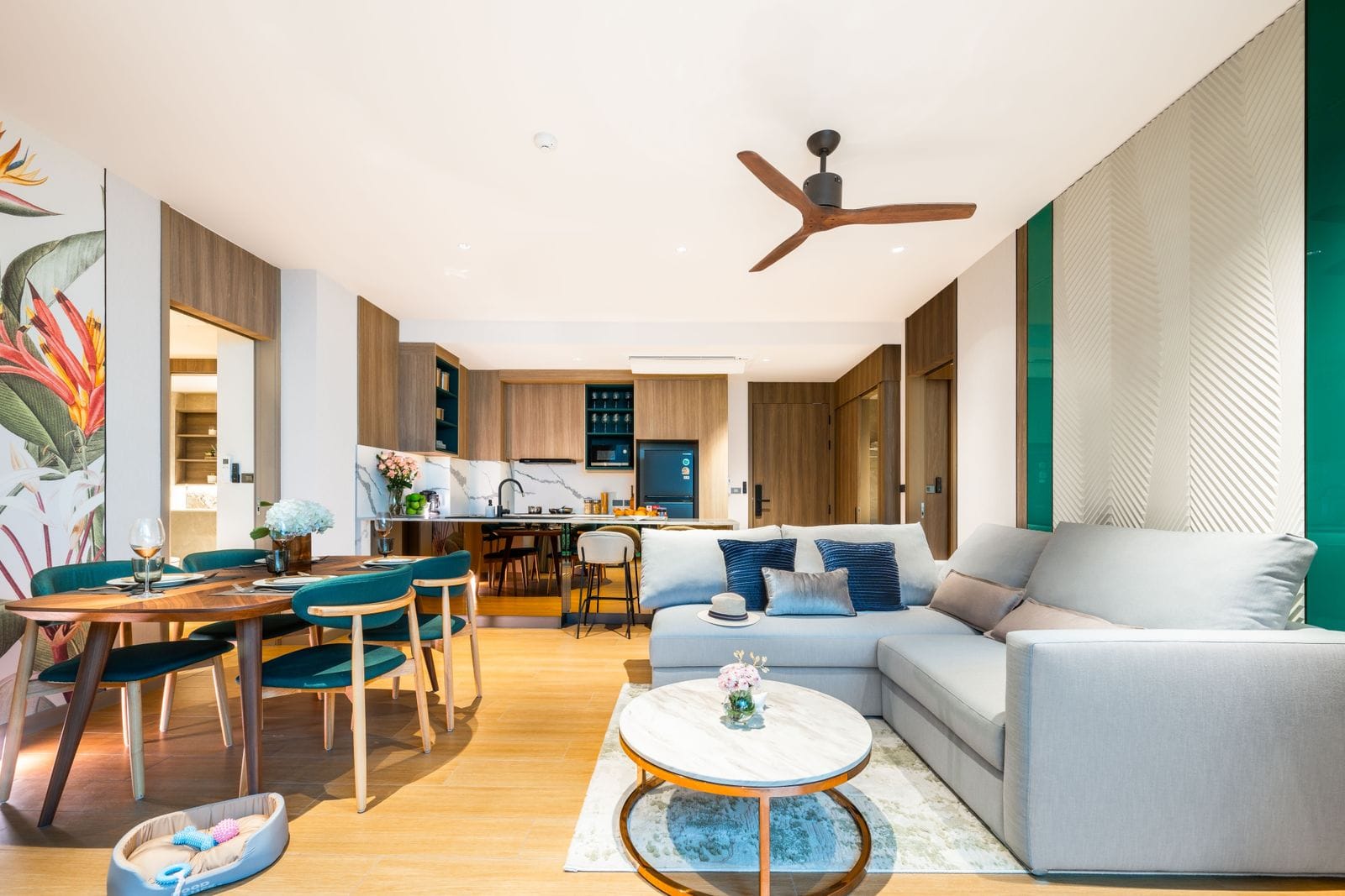 Photograph of the living and dining room of the Skypark Elara Lakelands Phuket show unit