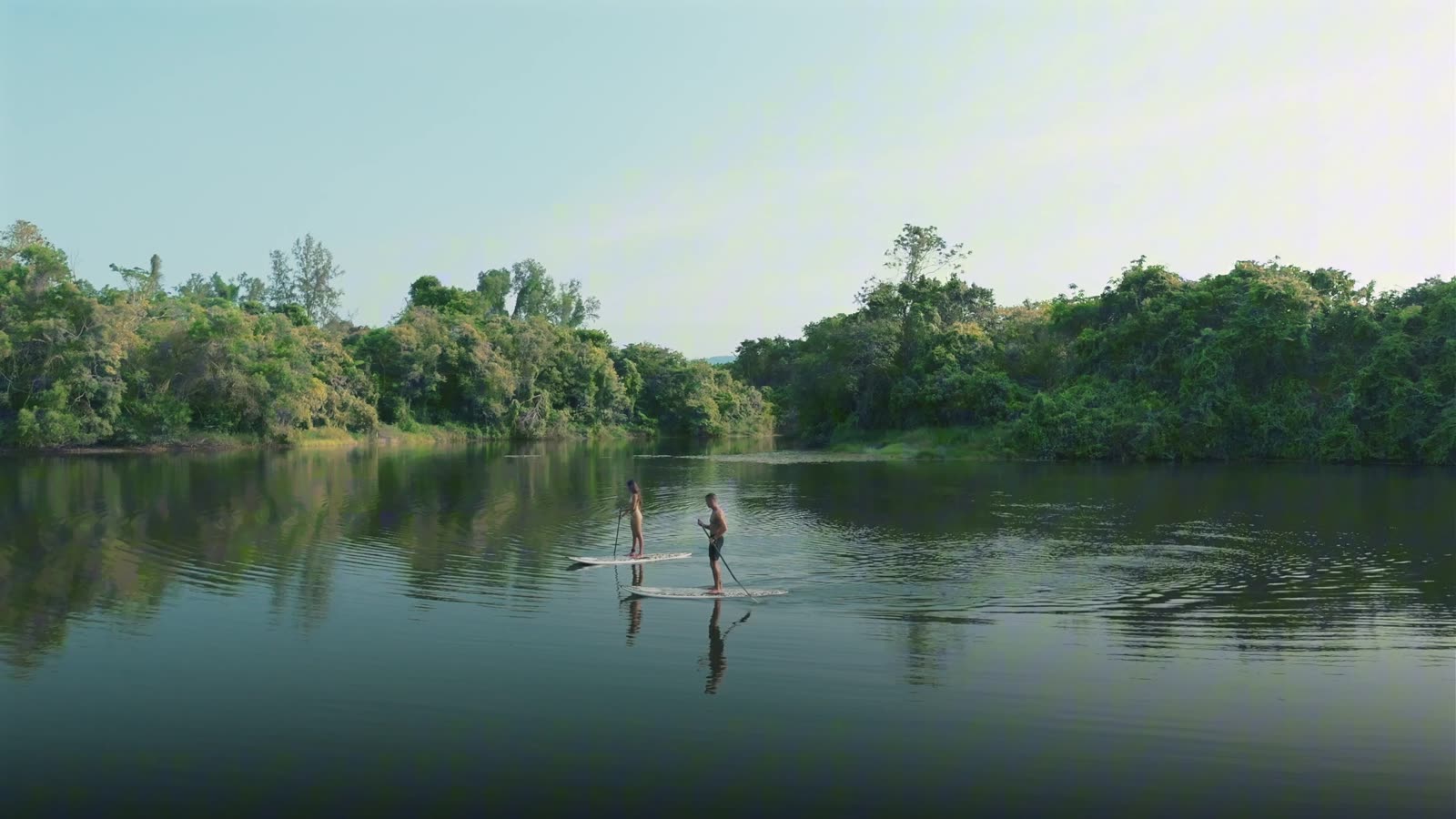 A paddleboarder on one of the lakes at Tri Vananda, Phuket