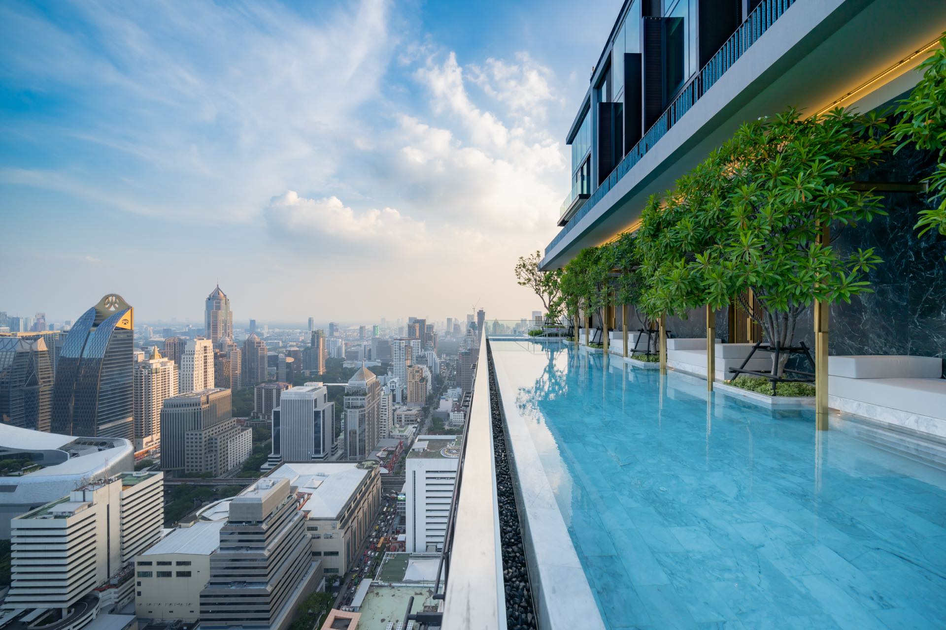 Rooftop infinity pool overlooking the Bangkok skyline at 28 Chidlom