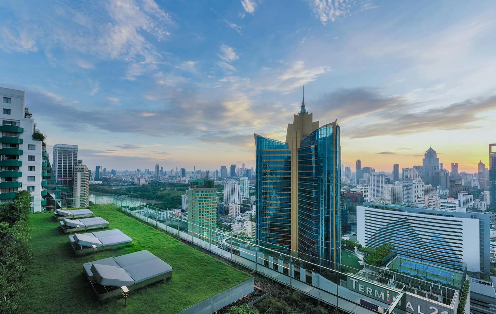 Celes Asoke: rooftop garden lounge with daybeds and city view
