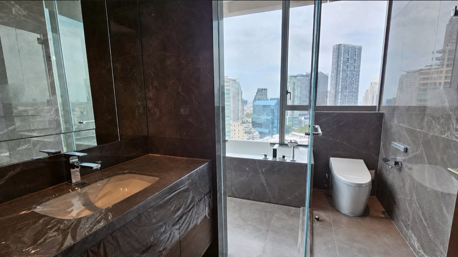 Interior of a resale residence at Dusit Central Park, 946 Rama IV Road, Bangkok, a two-bedroom home with a city view