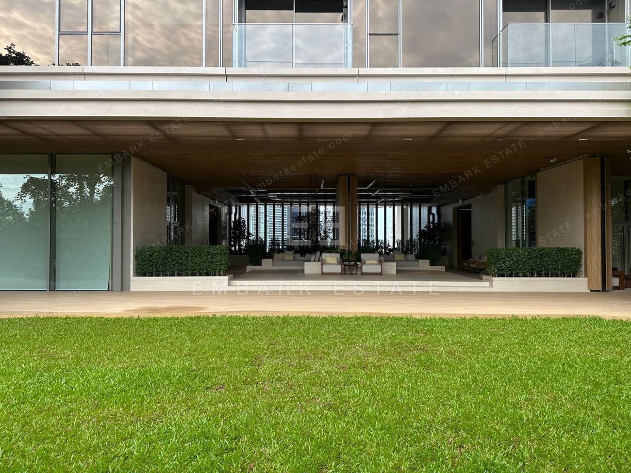 An open-air garden pavilion at Dusit Central Park set on a green lawn, home to Dusit Residences and Dusit Parkside on Rama IV Road in central Bangkok