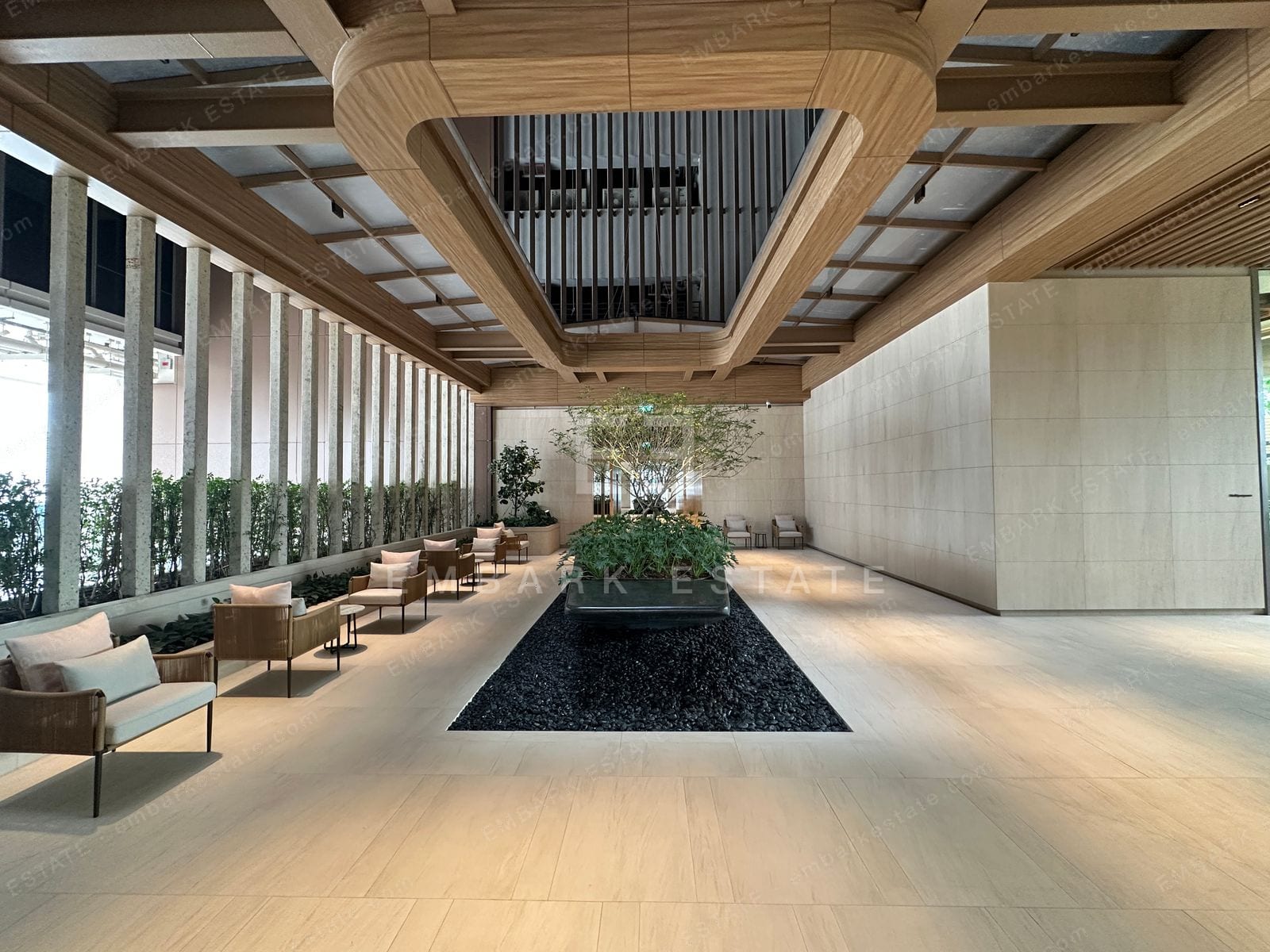 The light-filled garden lobby at Dusit Central Park, home to Dusit Residences and Dusit Parkside on Rama IV Road in central Bangkok