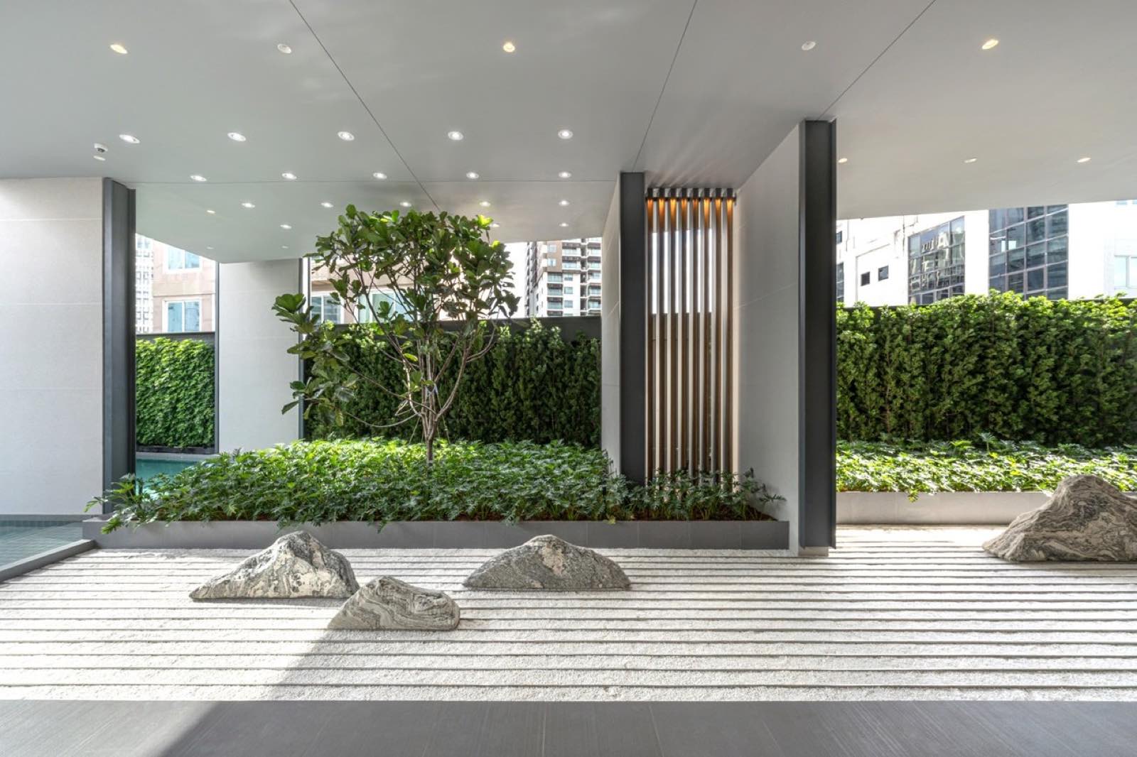 The Estelle Phrom Phong: arrival lobby zen rock garden courtyard