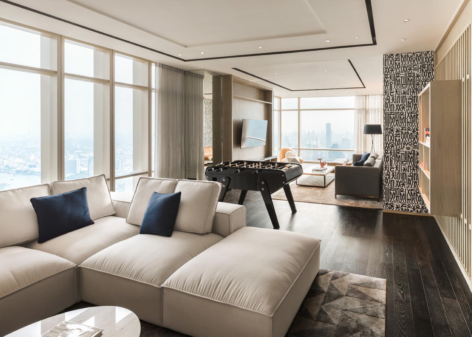 Four Seasons Private Residences Bangkok: residents' games and living lounge with river and skyline view