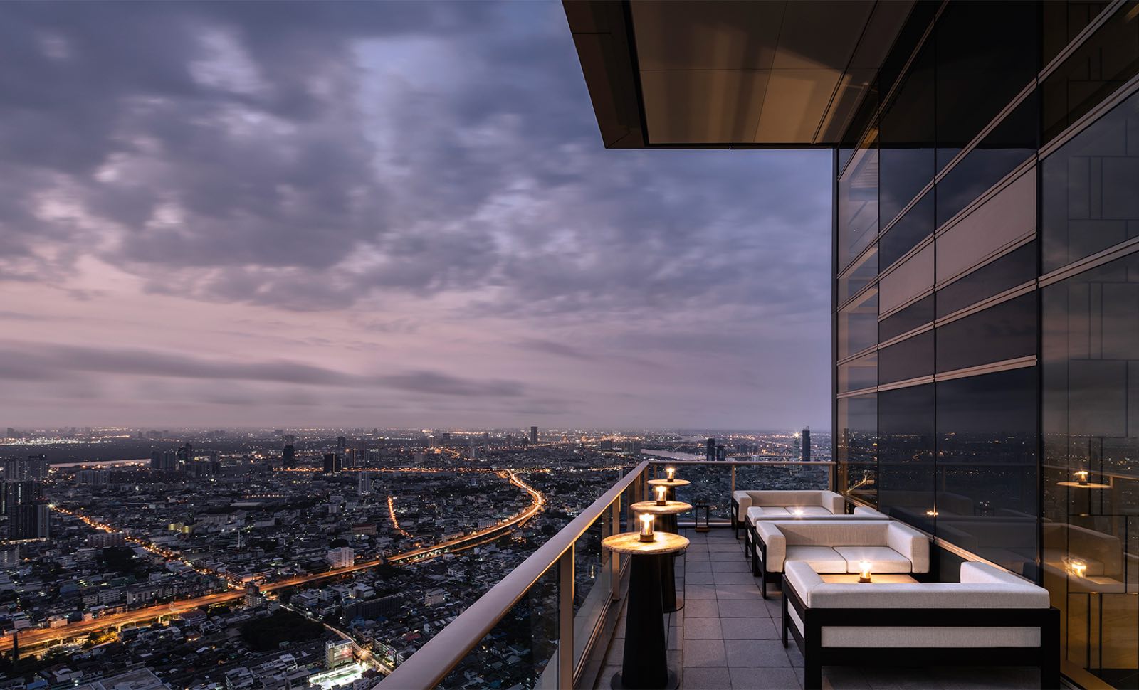 Four Seasons Private Residences Bangkok: sky lounge terrace with city view at dusk