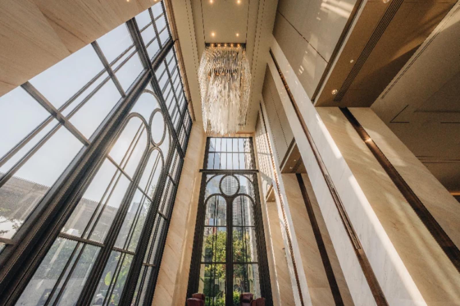 Hyde Heritage Thonglor: double-height marble lobby interior