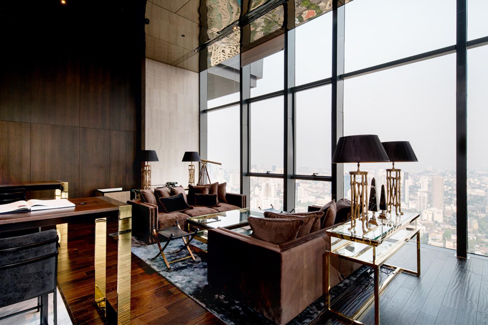 MARQUE Sukhumvit: double-height sky lounge with city skyline view