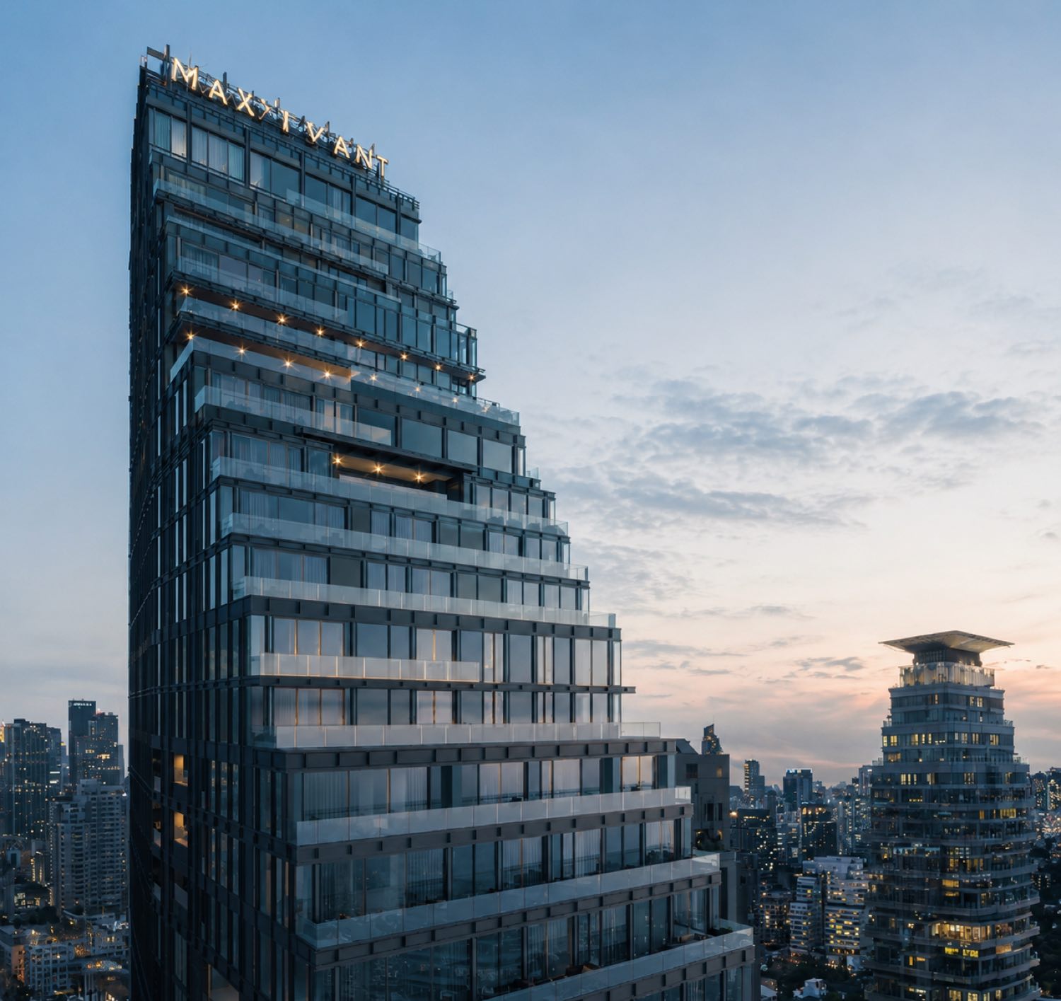 MAVISTA Phrom Phong: tower exterior at dusk against the skyline