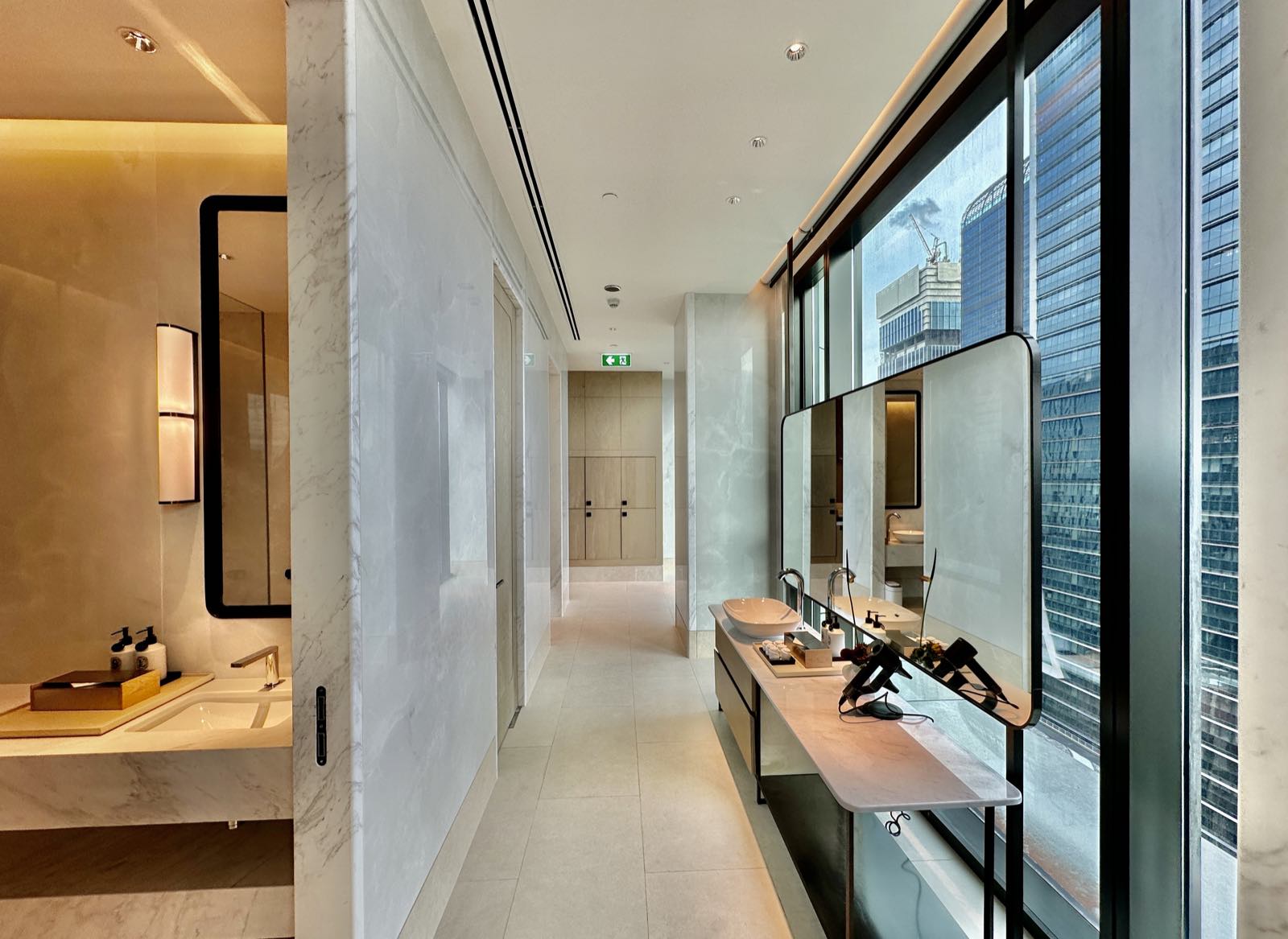 The spa changing and grooming room at ONE89 Wireless, One Bangkok, finished in marble with city views, a computer-generated render by One Bangkok