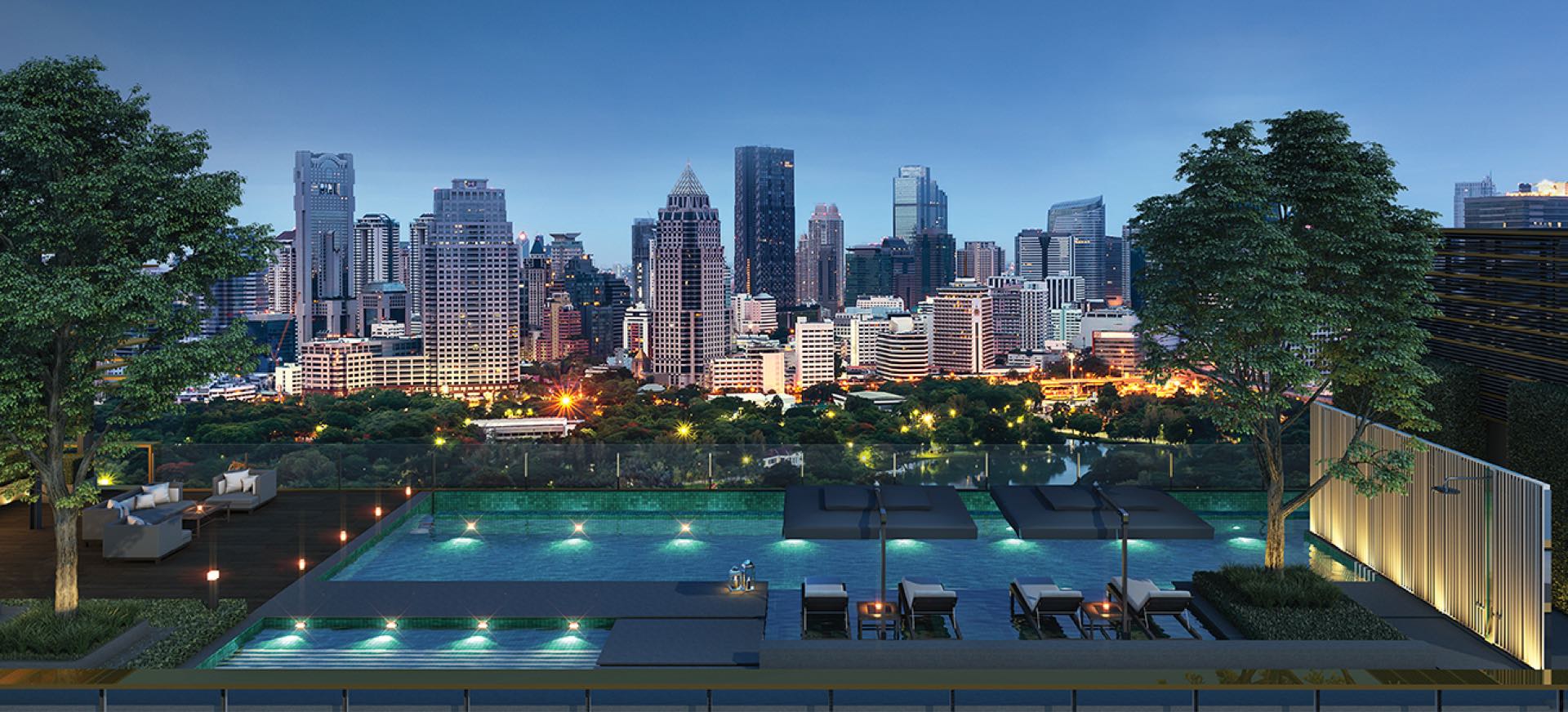 Rooftop swimming pool deck overlooking Lumphini Park at Sindhorn TONSON, Bangkok