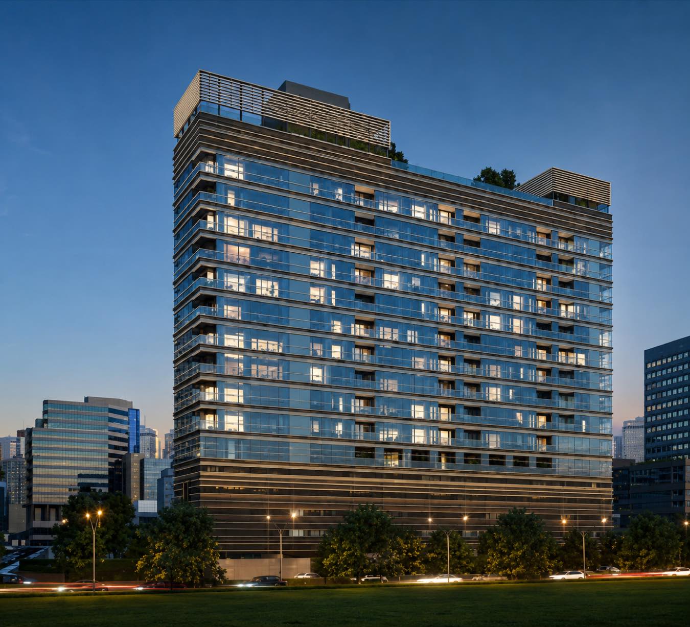 Sindhorn TONSON: the glass residential tower with its stepped crown lit at dusk beside Lumphini Park in central Bangkok, by Siam Sindhorn