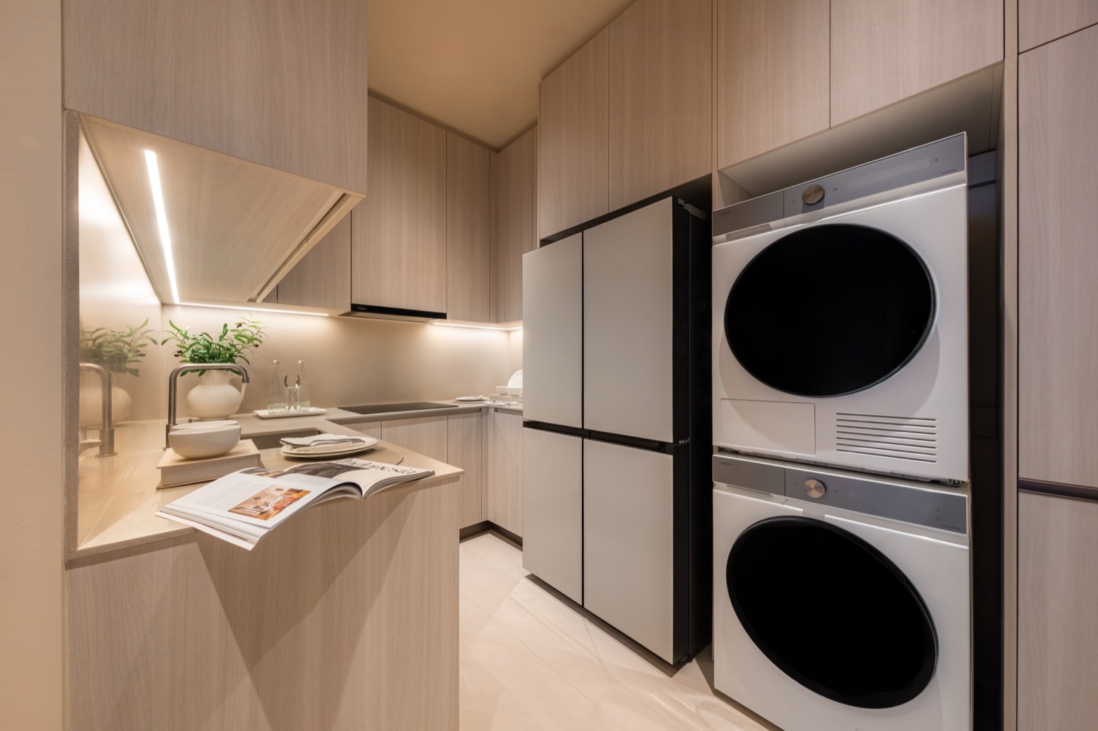 Photograph of the kitchen and laundry appliances in the STILL Sukhumvit 20 show suite