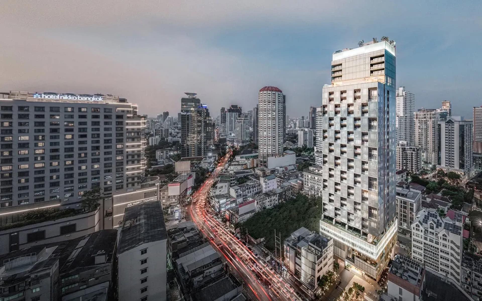 The Strand Thonglor: aerial drone view of the tower against the Bangkok skyline