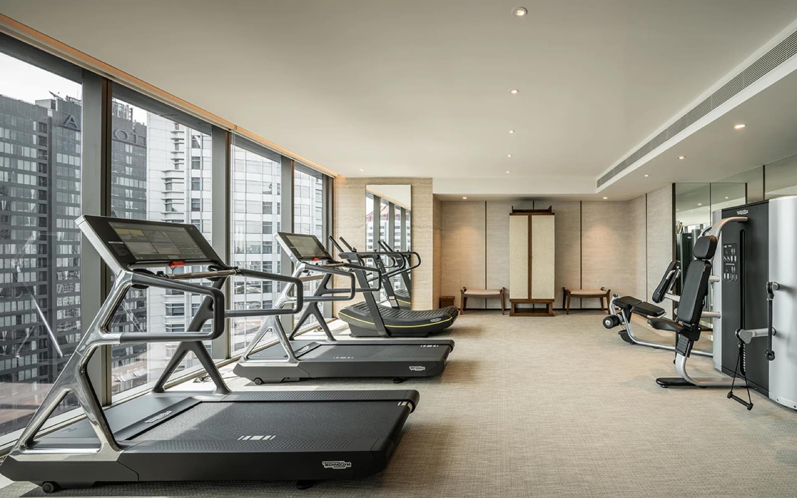 The Strand Thonglor: fitness centre with treadmills and city outlook