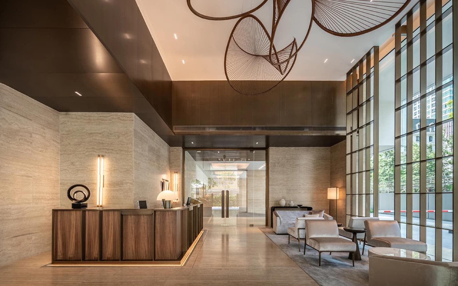 The Strand Thonglor: lobby reception and lounge seating