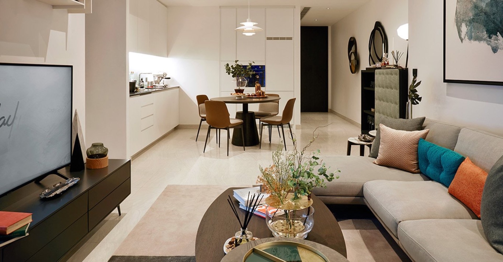 Tait Sathorn 12: distinctive sloped-roof tower exterior by day