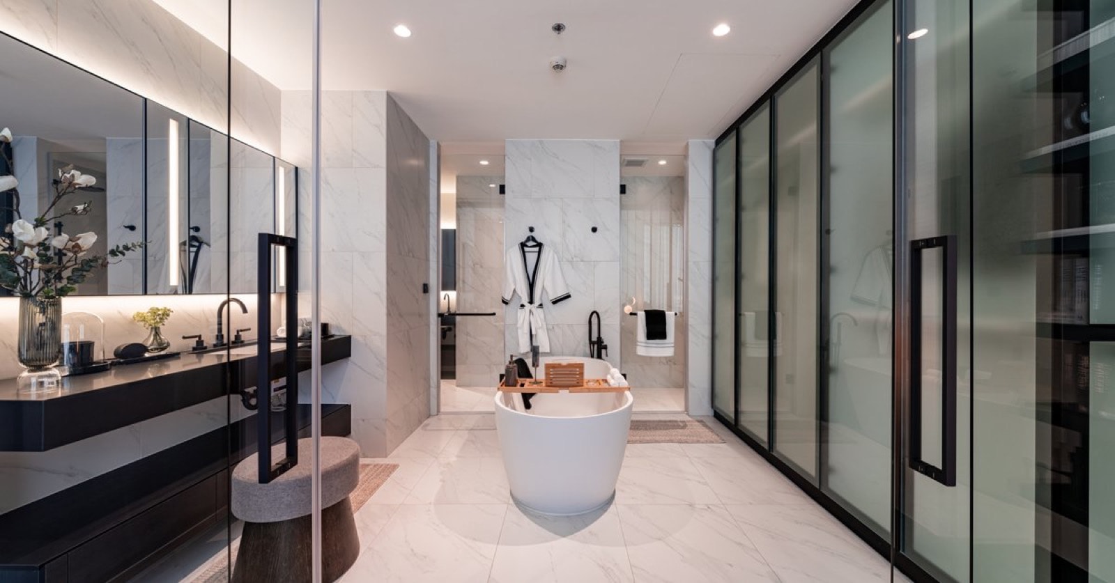 Tait Sathorn 12: double-height sky lounge and fitness area with panoramic view