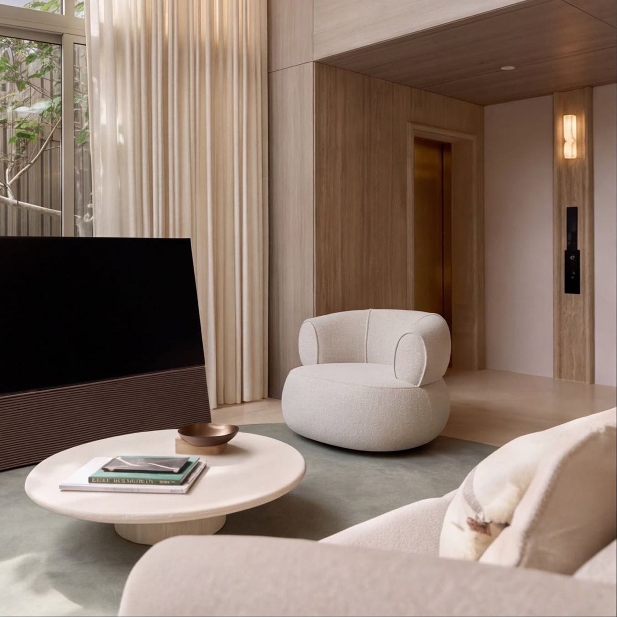 A living room beside the private lift in the Type A show house at The Residenti Ekkamai, Bangkok