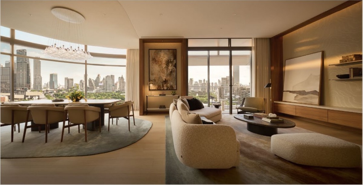 Living and dining room in an Upper House Residences Bangkok residence with floor-to-ceiling park views, interiors by BAR Studio