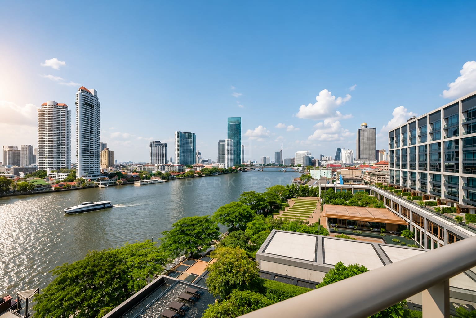 The view from the balcony at Four Seasons Private Residences, a ferry on the Chao Phraya with the far bank towers and the building's own gardens below