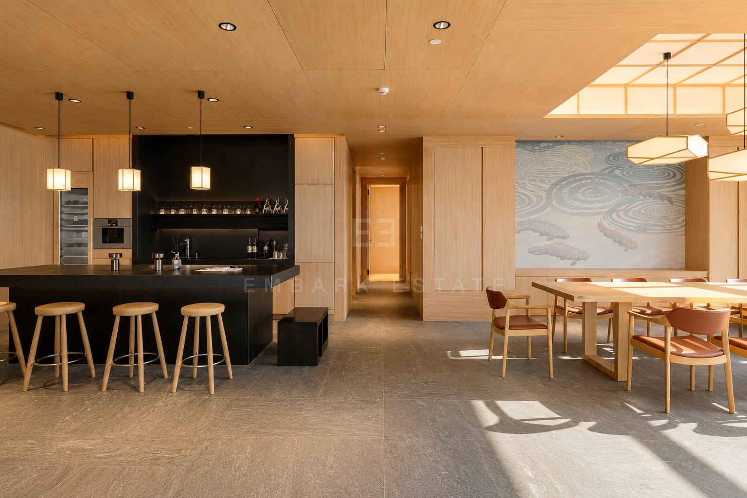 The bar at Four Seasons Private Residences, a black stone counter with timber stools beneath box lanterns, the dining table and its wave mural beyond