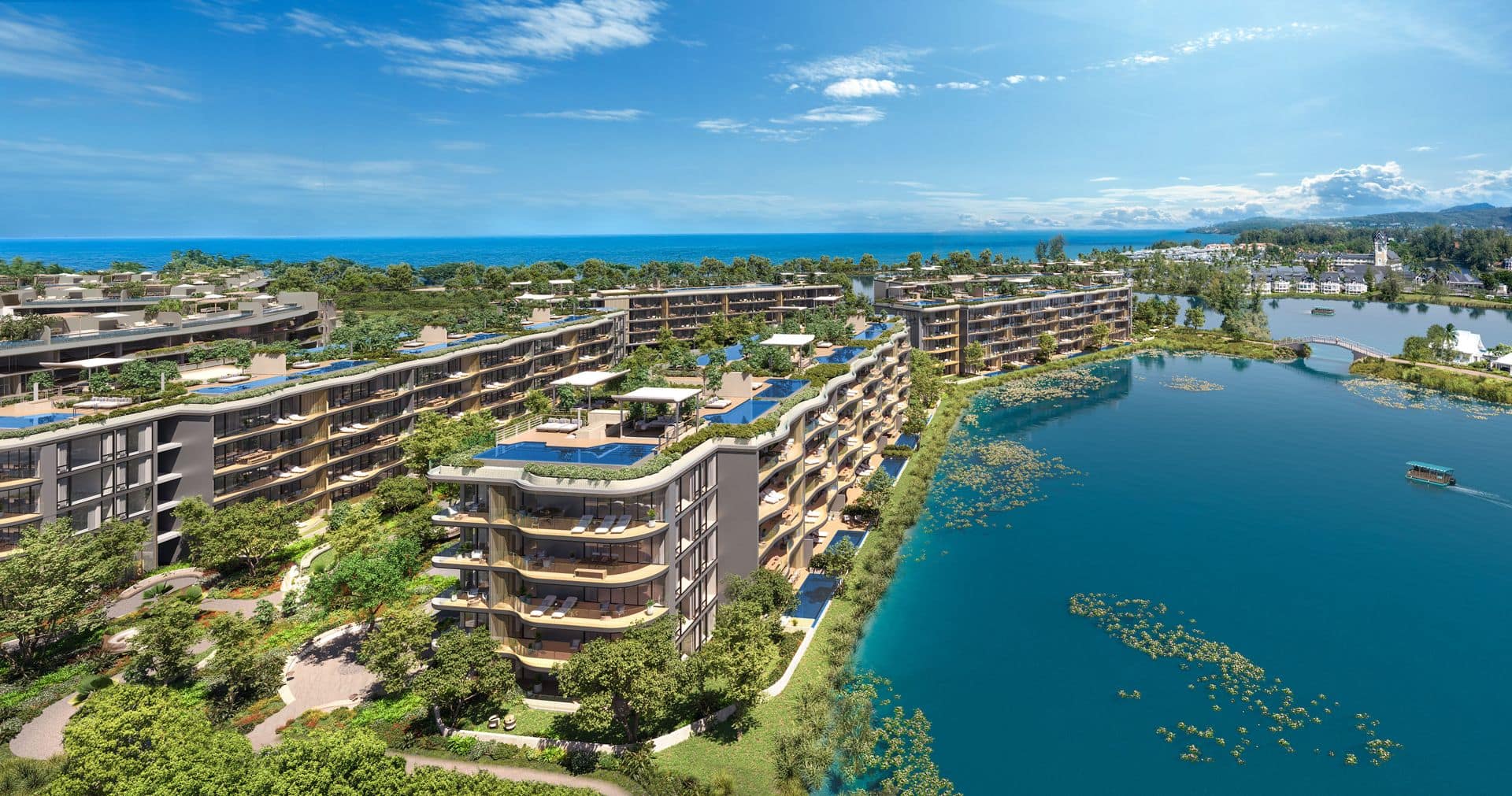 Render of Bellaguna Lake Residences Lotus from the air: Buildings D and E along the lagoon inside Laguna Phuket, rooftop pools on both, the sea beyond