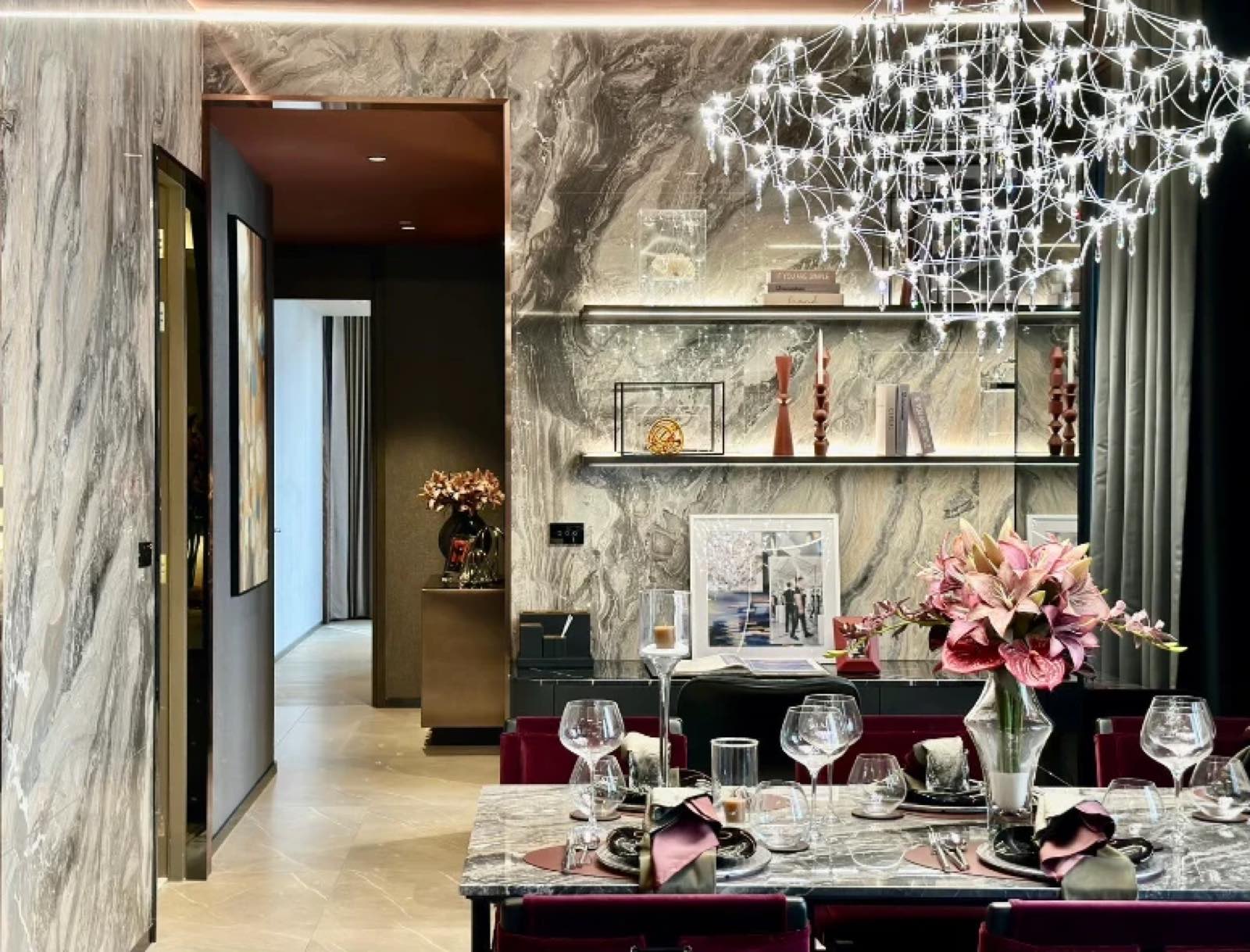 Hyde Heritage Thonglor: residence living and dining interior with marble feature wall