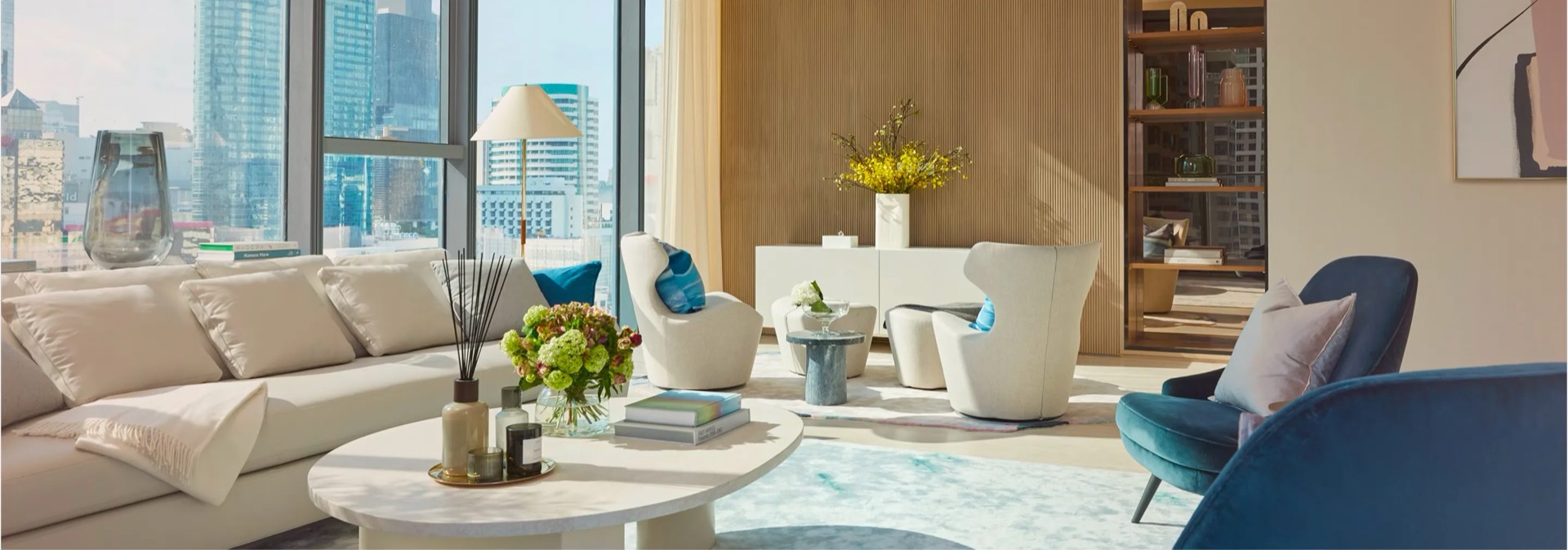 Living room with skyline views in a Scope Langsuan residence on Langsuan in central Bangkok